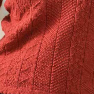 Learn how to knit a sweater with cables, ribs and more.