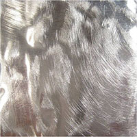 Sanded with 320-grit sandpaper while holding.