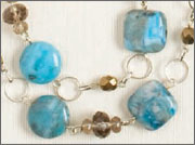 Blue Lagoon by Mary Pfeiler Wire-wrapped semiprecious stone and chain