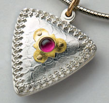 Use jewelry rivets to create a keepsake locket jewelry-rivets