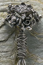 Create a unique piece from art clay - silver stemmed flowers tied together with wire. art-clay-silver