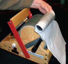 Learn how to use a drumcarder and other wool carding tools. wool-carding-tools