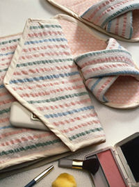 Handwoven seersucker cosmetic bag and slippers by Barbara Eychaner