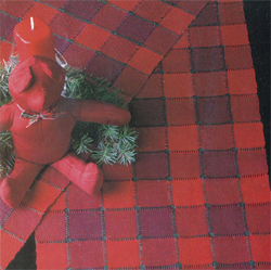 Handwoven holiday table runner by Deborah Dobbs