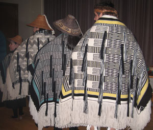 Dancers in ravenstail robes