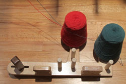 An inkle loom also makes a good cone stand.