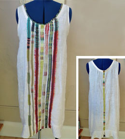 Front of dress with ribbon embellishments. Front of dress with ribbon embellishments.