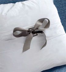 Try adding ribbon ties to secure an envelope closure. Try adding ribbon ties to secure an envelope closure.