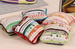 Cute selvedge pincushions are a great way to use up scraps. Cute selvedge pincushions are a great way to use up scraps.