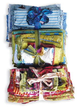 Organize your fabric into coordinated bundles. Organize your fabric into coordinated bundles.