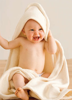 Hooded Baby Towel made with organic terry cloth by Katie Himmelberg. Hooded Baby Towel made with organic terry cloth by Katie Himmelberg.